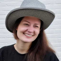 A young woman wearing a hat photo