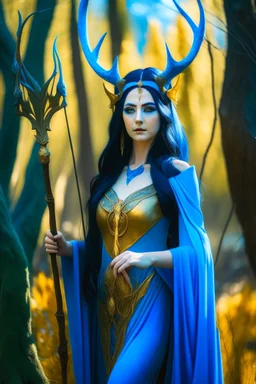 A picture of a beautiful blue faced Korean goddess with skin painted blue, blue body, blue torso, wild black hair, stag antlers, elven ears, golden skirt, holding a staff in a sunny forrest