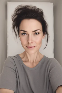 A selfie of a brunette woman, middle short hair taken at spa salon. showing attractive 37-year-old European woman. (She has white skin, tousled black hair, pretty face without makeup, big round brown eyes, cute profiled nose, detailed full lips, skin texture.)