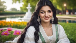 Hyper Realistic Photographic Close View Of Pashto Young Woman [With beautiful eyes beautiful lips and beautiful nose with Age 24 and beautiful long black hair] Happily Sitting and smiling with a dimple, On A Beautiful Green Grass Wearing A Complete Traditional Beautiful White Dress With full White Embroidered Sleeves Inside A Colorful Flower Garden Near A Water Pond With Water Fountain Between The Pond With Artist Street Lamps Surrounding Pond At Cloudy Moon Night, Dramatic & Cinematic Ambiance.