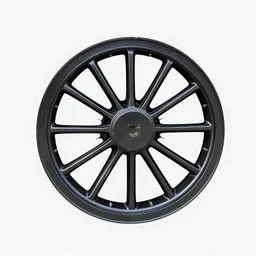 isolated image of a spoked steel wheel(black) from a steam train. vignette of just the wheel