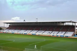 White neon light spells out work "ACF", stadium in Alentejo from Portugal, Shot on Canon EOS R5, 50mm lens, depth of field, shutter speed 1/ 1000, f/ 2. 8, white balance, 6000k. High resolution, realistic details, HDR efects, film grain, 4K. –ar 16: 10 –