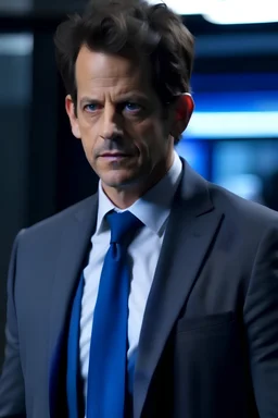 Ioan Gruffudd as Doctor Who, lightweight grey suit and a navy polo.