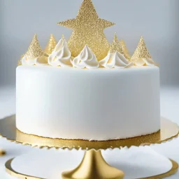 A picture of a simple white cake with golden decoration