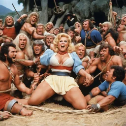 [high res photo by Russ Meyer] it's a scene from Gulliver where the giant is a blonde woman: she's tied up and tickled by lots of dwarfs, she wriggles and writhes with laughter, she's on the ground in crop top with her stocks, surrounded by ropes, surrounded by the tiny dwarfs tickling her relentlessly.