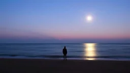 A solitary figure stands on a tranquil beach under a twilight sky, illuminated by the moonlight reflecting on calm waters, creating a serene and contemplative atmosphere.