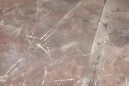 scratched garage floor, low angle
