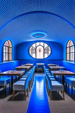 A restaurant with the outer shape of the walls in blue and a white floor. It contains one table in the middle of the restaurant, and the walls are oval in shape, containing 30 chairs.