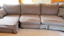 brand new couch in 2 pieces in living room