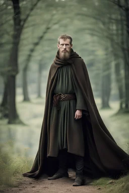 head to toe photo of a Celtic man in a cloak
