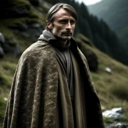 mads mikkelsen dresses in worn traveller cloak