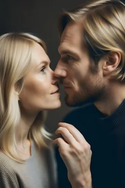 a blonde woman whispering next to a mans ear