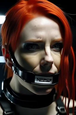 A movie scene with redhead girl gagged with sculpted abs and tape over mouth for protest