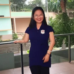 Ms Usa Somboon is the principal of the international school of Thailand. She is old, fat and wears glasses