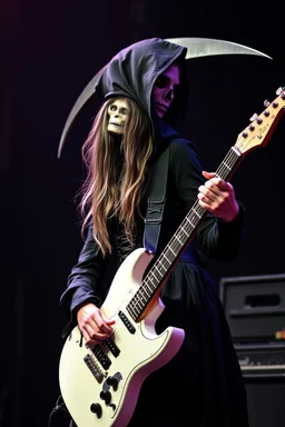 goth girl(dressed as the grim reaper) rockin' on the guitar, leaning back