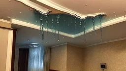 water leaking from ceiling in hotel room