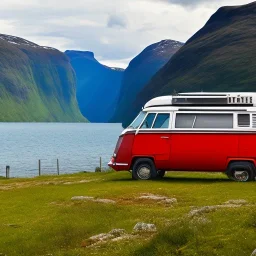 A Campervan is parking in a norwegian Fjord