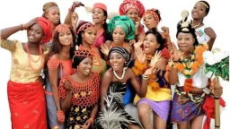 Nigerians from different ethnic and tribal groups posing for a picture dressed in the ethnic attire