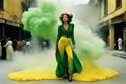 [iconic color photo by Helmut Newton] EMeRGENCE: Her bended figure emerged from the chaos, surrounded by the swirling backdrop of yellow dust and billowing smoke that cloaked the attack in the bustling yellow market plaza. An Italian woman clad in plush green trousers and a worn velvet green pull-over, her back heaving with urgency, navigated the labyrinthine alleys with a grace born of desperation.