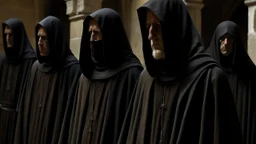 hooded monks in black robes in egypt