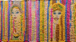 A Wide Panel in which 5-6 potraits are deveped with Wool threads tapestry artwork connected with each other through threads,