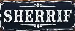 large and wide hand painted old western sign that reads: "SHERRIF" white on black with inset boarder stripe in white aged