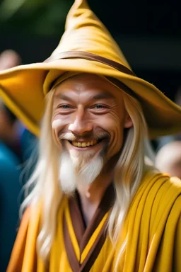 blond wizard smiling from far