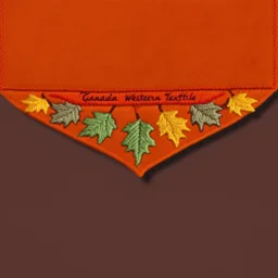 an autumn colored textured cloth embroidered ornamental leaves, pointed bottom, on darker textile background, embroidered text across top, Canadian western textile art design