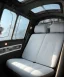 Placeholder: Ultra realistic back seat of limousine image, wide angle view, Alice woman and white rabbit man, many color balls, circus clothing, long hair, smoke, feather long coat, soft color, highly detailed, unreal engine 5, ray tracing, RTX, lumen lighting, ultra detail, volumetric lighting, 3d, finely drawn, high definition, high resolution.