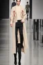 Placeholder: a guy winter fashion runway with modern clothes inspired by Superman style clothes, embroidery elegant fashion beige tones