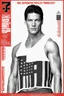 Placeholder: 20-year-old, extremely muscular, short, buzz-cut, military-style haircut, pitch black hair, Paul Stanley/Elvis Presley/Keanu Reeves/Pierce Brosnan/Jon Bernthal/Sean Bean/Dolph Lundgren/Patrick Swayze/ hybrid, as the extremely muscular Superhero "SUPERSONIC" in an original patriotic red, white and blue, "Supersonic" suit with an America Flag Cape,