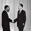 Placeholder: Martin Luther King Jr and Jerry Seinfeld shaking hands