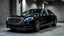 Placeholder: A black Mercedes-Benz Maybach parked in a luxury garage