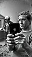 Placeholder: An old picture style of black and white and very bad quality old camera with cracks of Mark Zuckerberg holding an IPhone the year 1900 in the background an alien watching the iPhone with mark