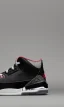 Placeholder: Jordan 3 black sneaker. Inside red fires.