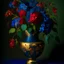 Placeholder: Flowers in midnight blue flowers, red flowers and green leaves in a gold vase. Light background