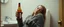 Placeholder: drunk woman with a hot dog in bread sleeping over in bathroom