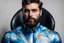 Placeholder: A handsome bearded guy with Shell plastica design suit on a shellchair in studio, detail Paint face