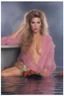 Placeholder: full body portrait - 20-year-old Tawny Kitaen, wearing a pink, bikini in a hot tub - 32k, UHD, 1080p, 8 x 10, glossy professional quality digital photograph - dark blue and dark red, and light maroon and purple and foggy black gradated background with a paint splattered wall, strawberries, stars, planets, galaxies, an assortment of bright, colorful floral arrangements, black roses, blue roses, red roses, yellow roses, pink roses, dandelions, honeysuckle roses, tulips, carnations,