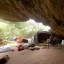 Placeholder: barefoot traveller cave