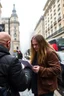 Placeholder: A stalker wants an autograph from a long-haired rock musician on a street in central London. The stalker is an overweight soon bald 25-year-old and looks a bit slimy, the atmosphere is oppressive and unpleasant, lot of traffic and london busses, hectic hour, a nice hotel, fog and rain