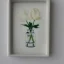 Placeholder: tiny oil painting of single long stem pressed flower, white canvas, modern frame, shadows, ghostly, melancholy, tender, moody, vintage, delicate arrangement, beautiful composition, etsy, aesthetic layout, plain solid white background