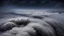 Placeholder: looking down from space at a sharp angle at the mist and clouds and storm, surrounded by the mist at night starry sky. majority of the image is space