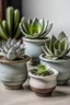 Placeholder: Generate an image of a set of vintage-inspired mini concrete succulent planters shaped like delicate teacups, each holding a charming succulent.