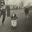 Placeholder: Creepy old photo of rainbow zippy monster chasing children at new year