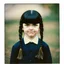 Placeholder: wednesday addams as a child, braids, frange, worn polaroid, 1970s, liminal, angry