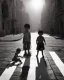 Placeholder: children playing on the street capture them against the sun and make an art silhouette, details, sharp, black and white 8k