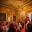 Placeholder: Party in a schloss, cheering people, Austrian aesthetic, warm colors, 8k, HD, cinematography, photorealistic, Cinematic, Color Grading, Ultra-Wide Angle, Depth of Field, hyper-detailed, beautifully color-coded, insane details, intricate details, beautifully color graded, Cinematic, Color Grading, Editorial Photography, Depth of Field, DOF, Tilt Blur, White Balance, 32k, Super-Resolution, Megapixel, ProPhoto RGB, VR, Halfrear Lighting, Backlight, Na