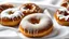 Placeholder: just Sugar-coated fluffy no holes hungarian Donuts lies on white Cloth, high realistic, detalied, random background, perfect food Photo