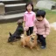 Placeholder: Kim children love dog